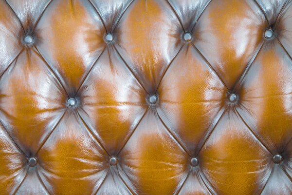 Door upholstery. Brown leather texture