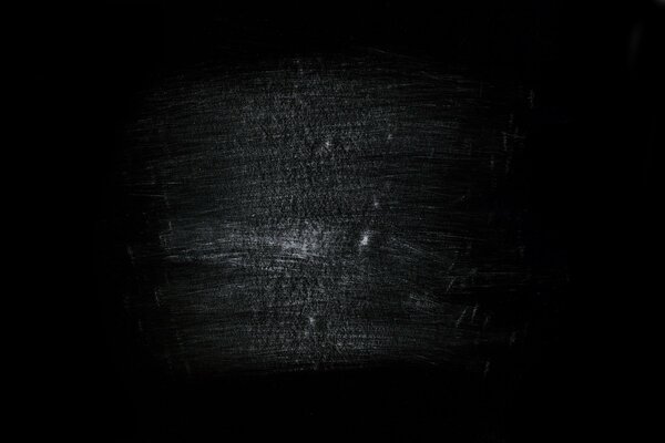 White scratches on a black background