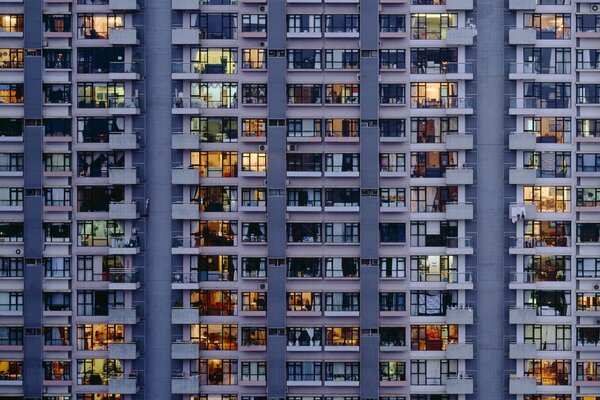 The house of the future. Lots of apartments, light, people