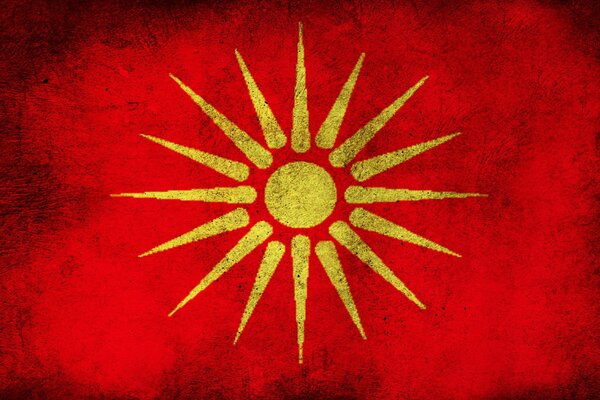 Flag of old Macedonia. Yellow star on a red background