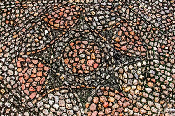 Las piedras del patrón de mosaico se ven como un patrón