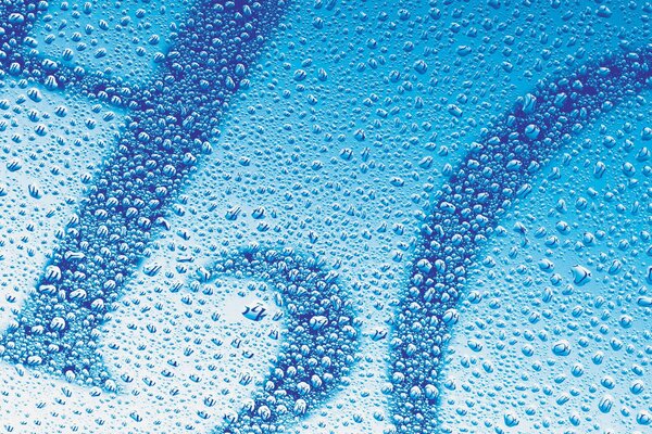 Water drops on blue glass