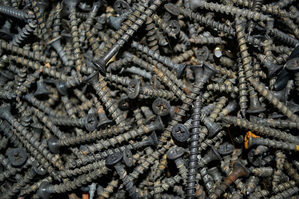 Old metal screws with rust