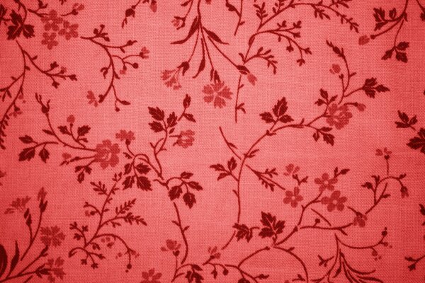 Tissu rouge avec motif de fleurs