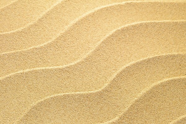 Sandkörner in Form von Wellen