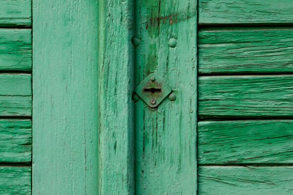 The door lock. Green door