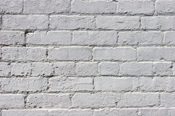 Stara ściana z białej cegły