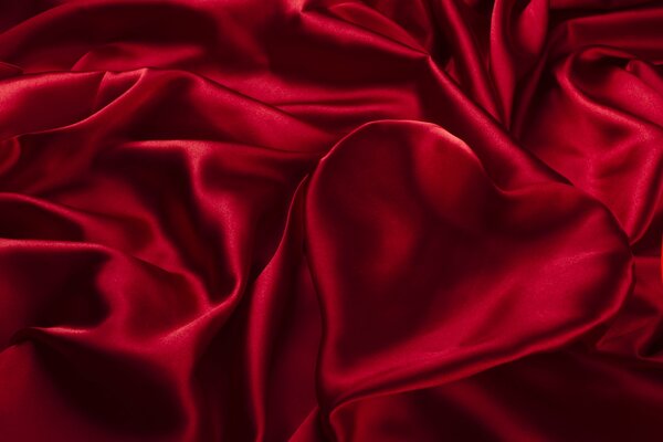 Silk heart made of red fabric