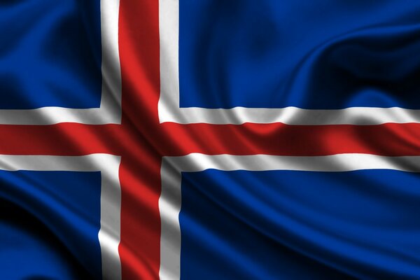 En la imagen se desarrolla la bandera de Islandia