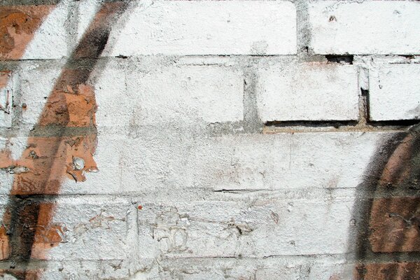 Image d un vieux mur de briques blanches décoré