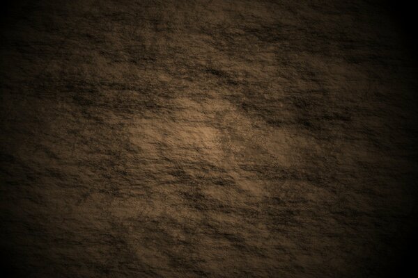 Texture in rilievo con irregolarità visibili sul marrone