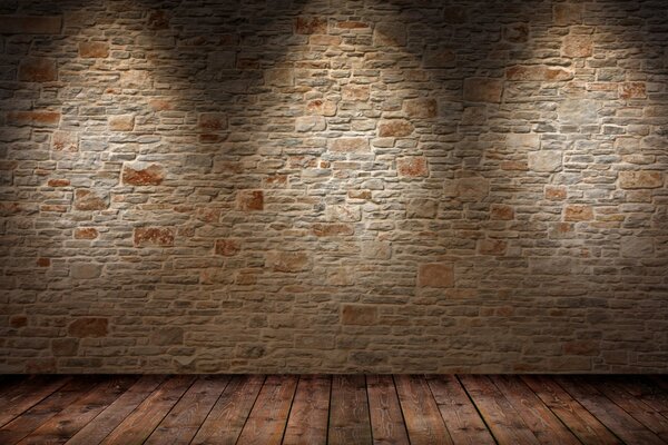 La textura de la pared de piedra se ilumina con luz