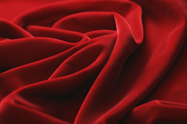Relief folds of red linen fabric