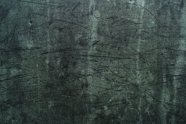 Dark green background with scratches