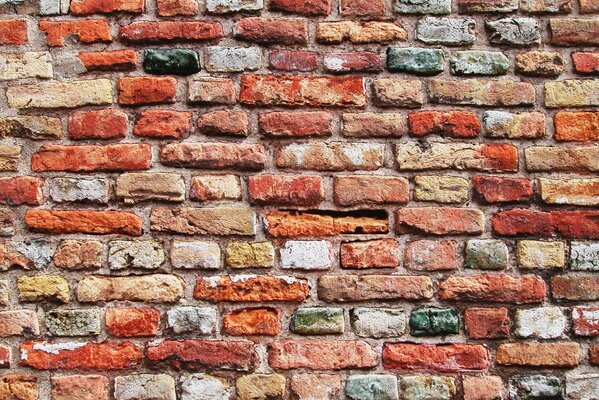 Mur de briques de différentes couleurs