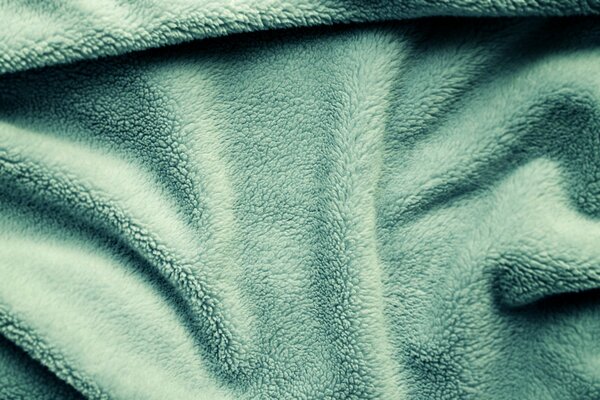 Green blanket of soft texture