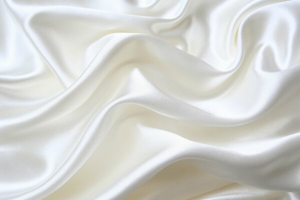 Folds of milk silk fabric