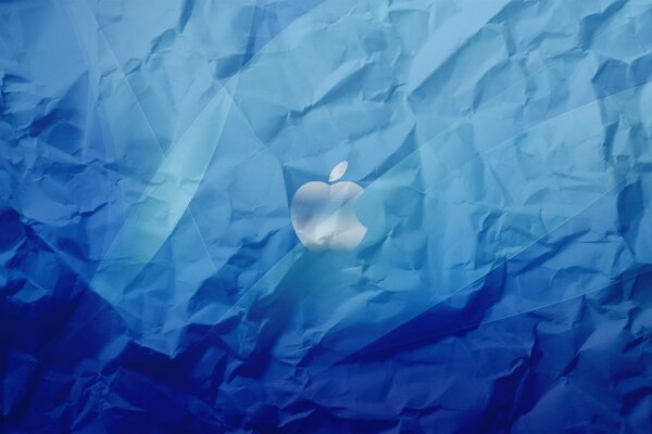 Apple brand on a crumpled blue background