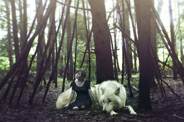 Mädchen mit einem Wolf im Wald