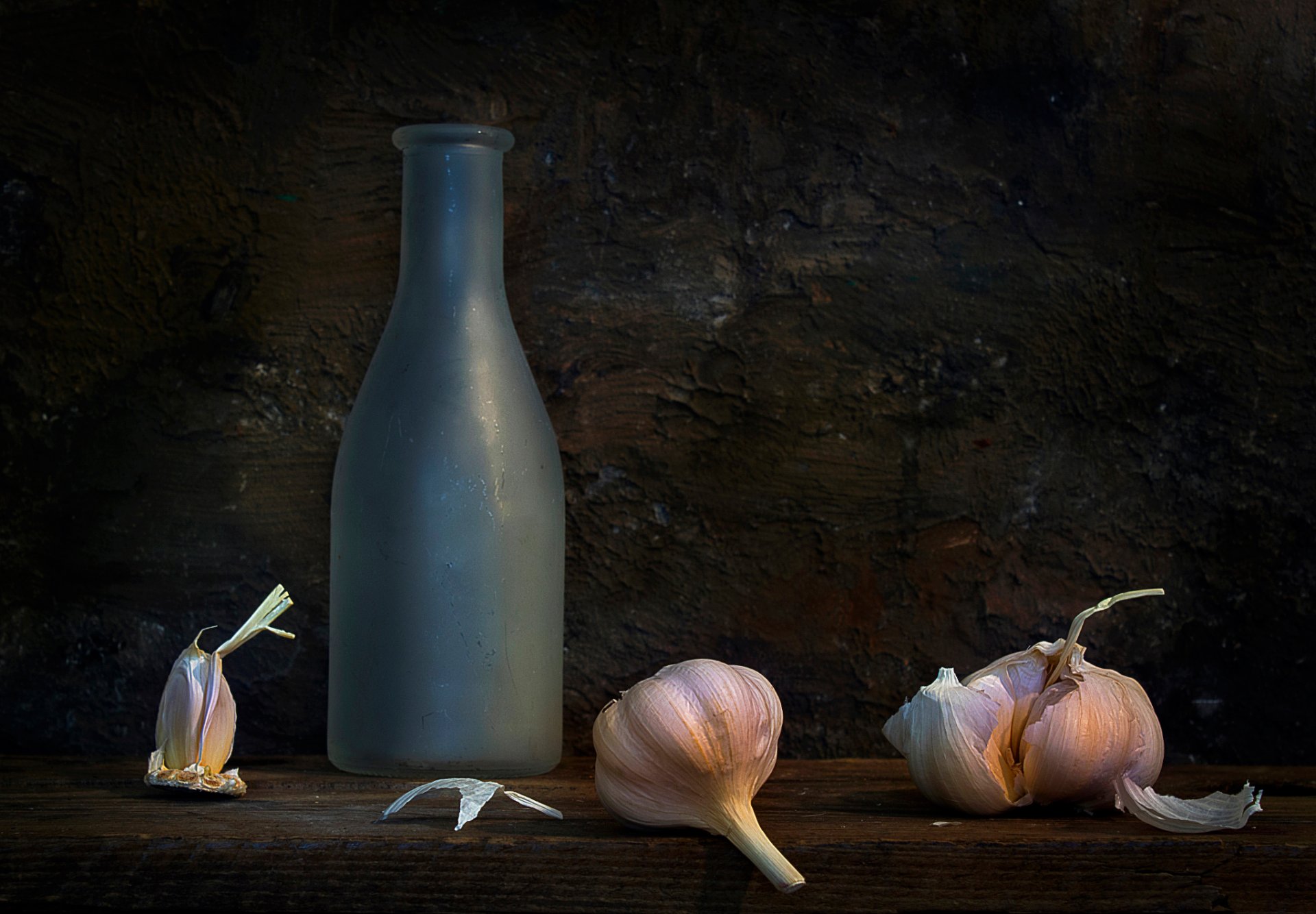 the pungent panacea still life a bottle garlic composition