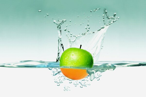 Splashes of water from an apple