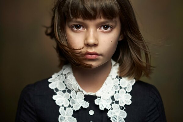 Beautiful photo portrait of a brown-eyed girl