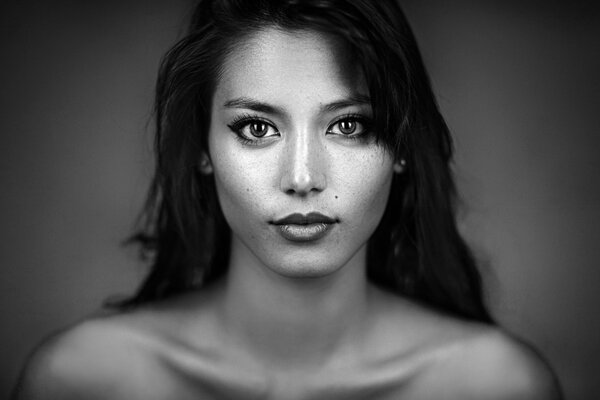 A look from a black-and-white photo portrait of a girl