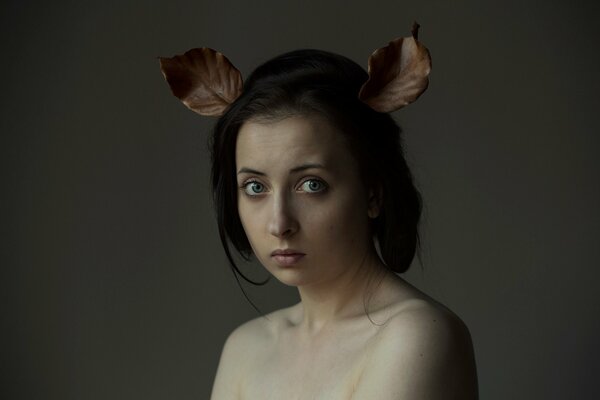 Portrait of a girl with ears made of castings