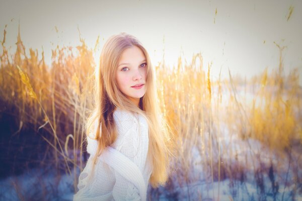 Russian beauty in a snow-covered field