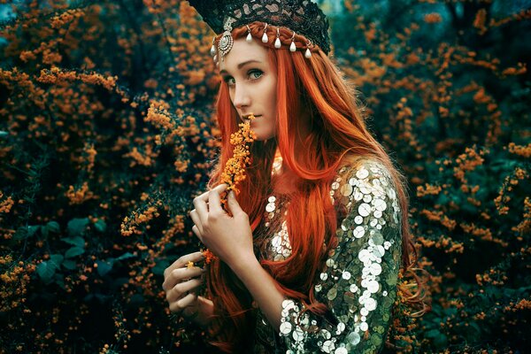 Red-haired Bella Kotak and the fern bloom