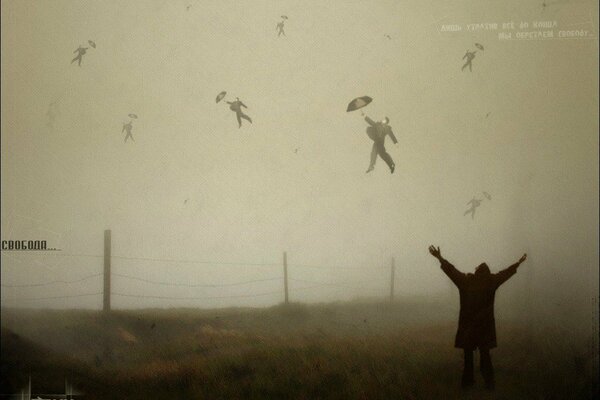 People flying in the sky with umbrellas in the fog