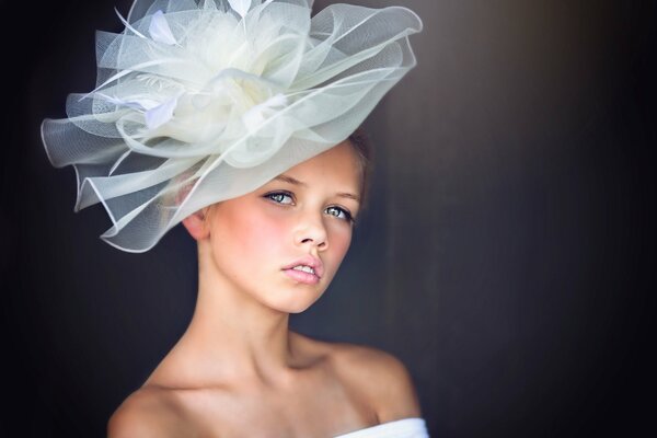 The girl Julia in a beautiful hat