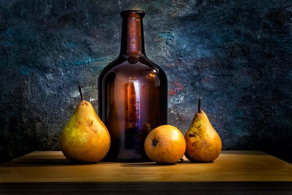 Still-life. Glass bottle. Pears