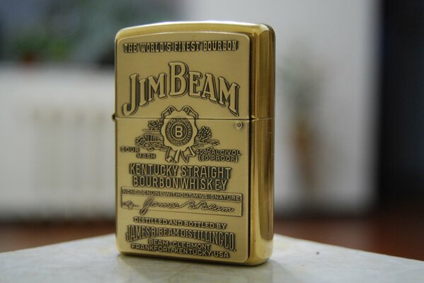 Golden lighter Jim Beam