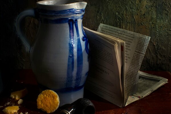 Still life with a jug newspaper and pipe