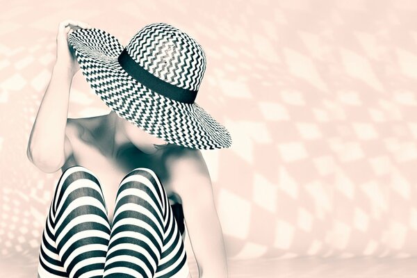 Striped style of a young girl in a hat