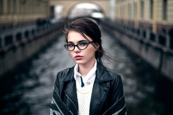 Portrait of October Maximova in glasses