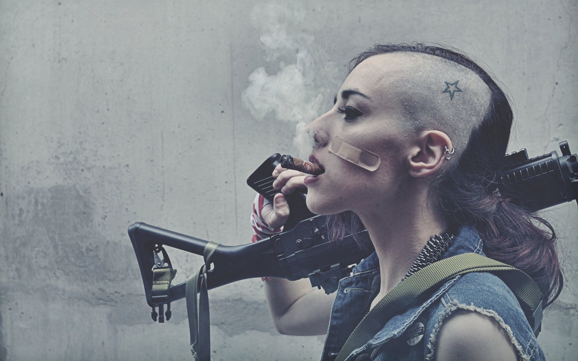 tank girl brunette haircut tattoo cigar smoking weapon