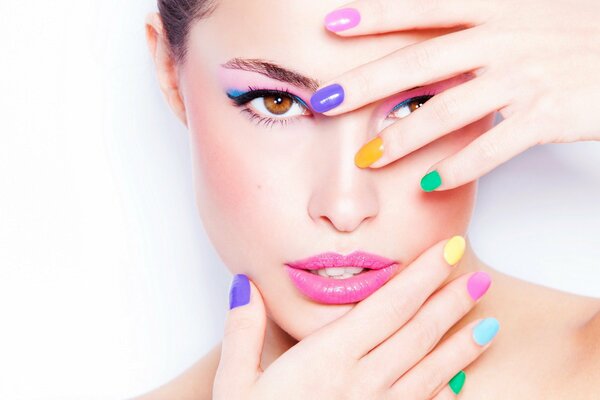 Bright colored manicure and makeup