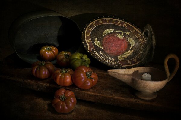 Vintage style tomatoes and candle