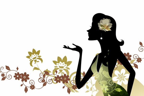 Digital art. Silhouette of a girl and fancy flowers