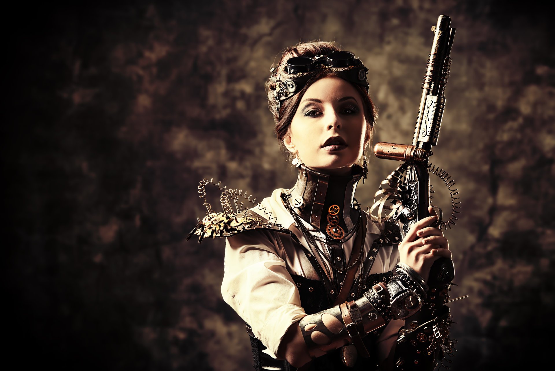 ragazza steampunk fili armi occhiali stile