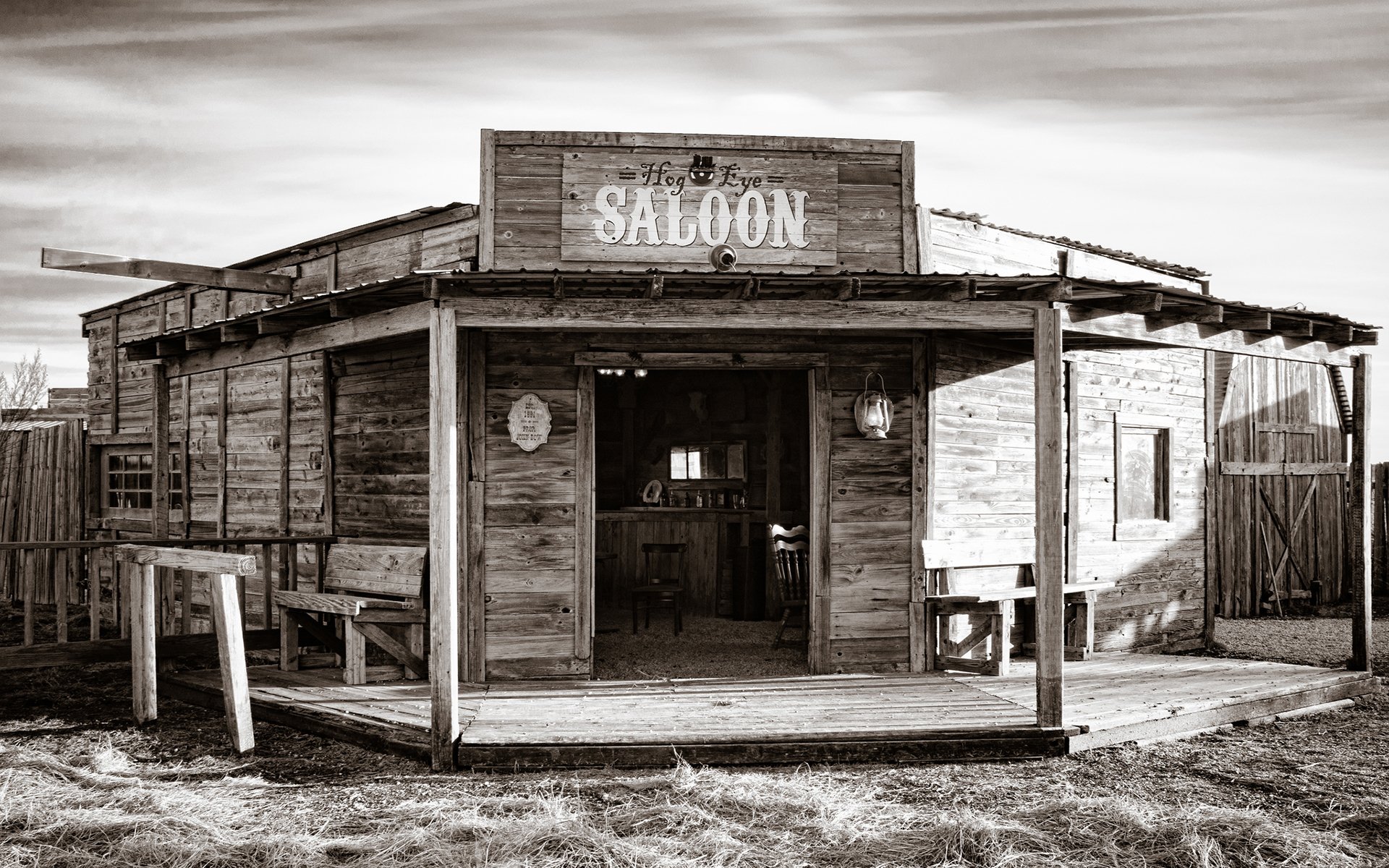 bar salón de madera estilo dicky oeste atmósfera sol luz sombra blanco y negro