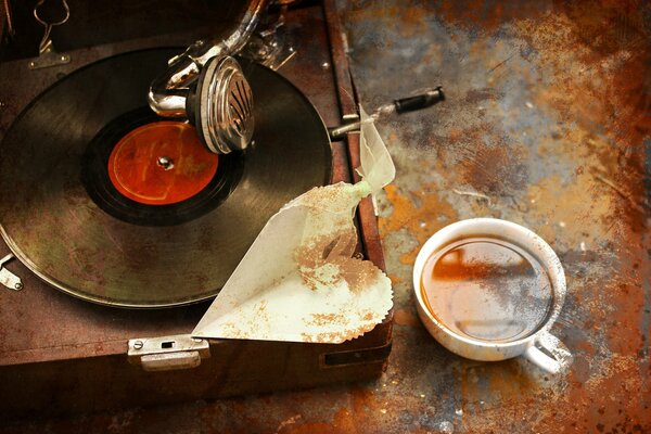 Antique gramophone and a cup of tea