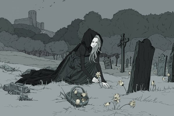 A girl at the grave lays flowers