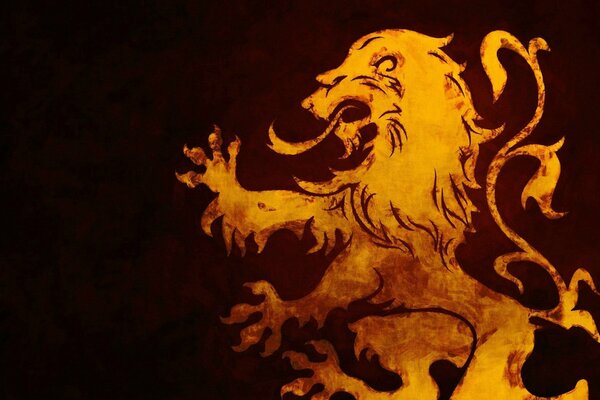 León de fuego sobre un fondo oscuro. emblema