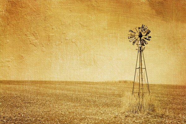 Eine Windmühle und ein goldenes Feld