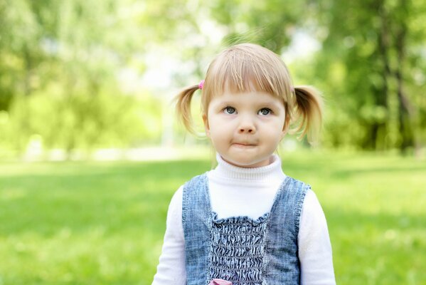 Girl little happiness in the park