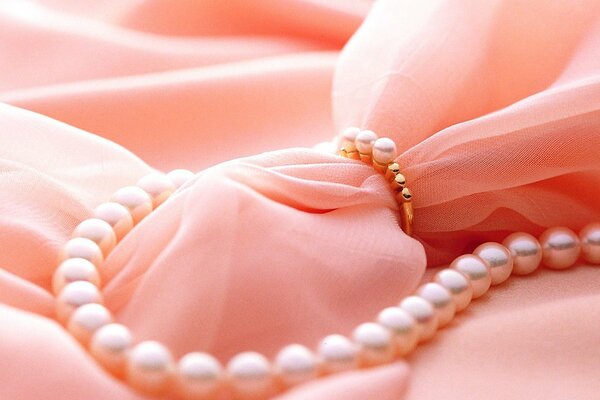 Pearl beads on delicate fabric