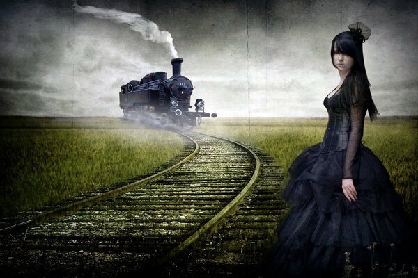 A girl in Gothic style is waiting for a train